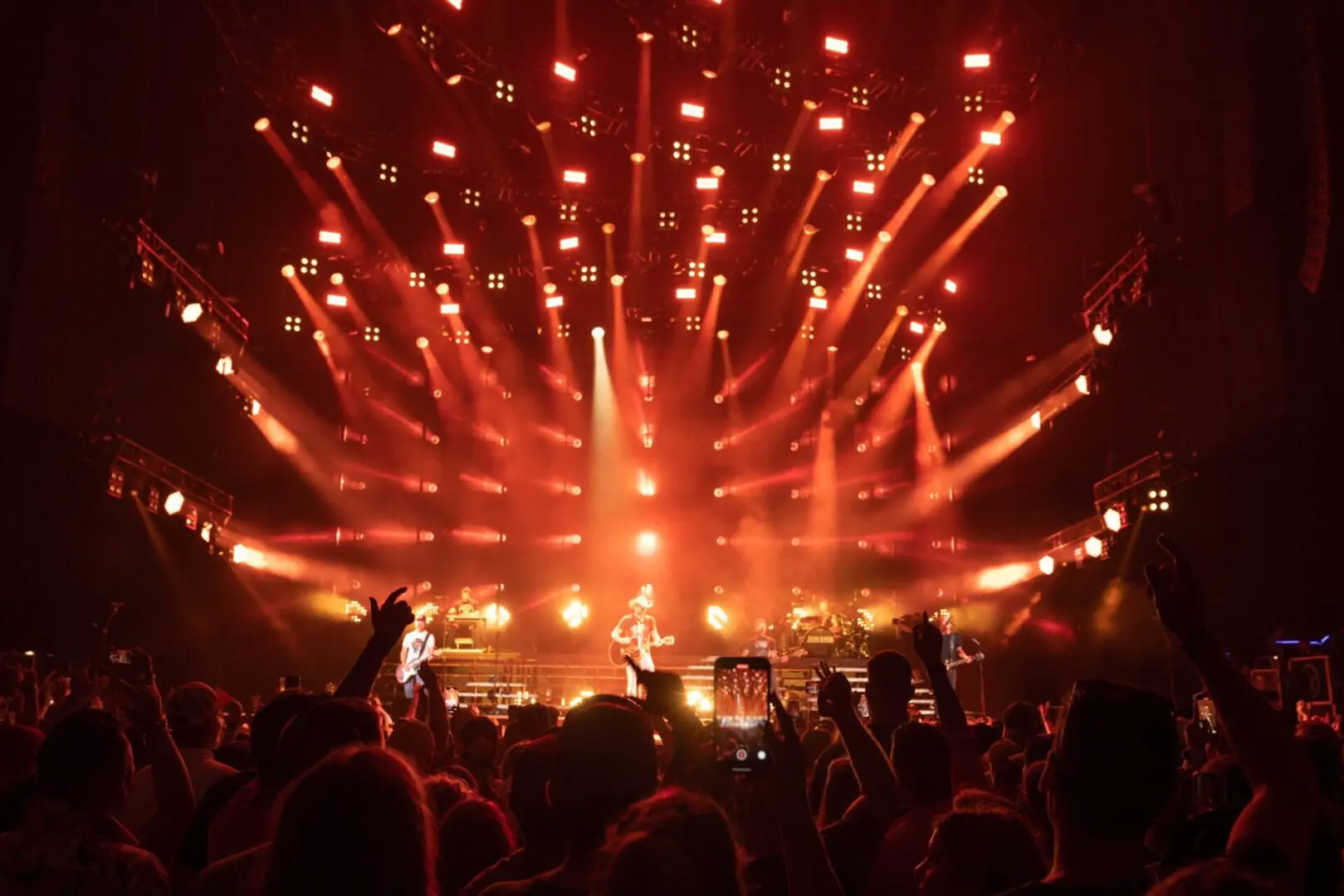 A beautiful sunset with vibrant orange and pink hues over a calm sea.