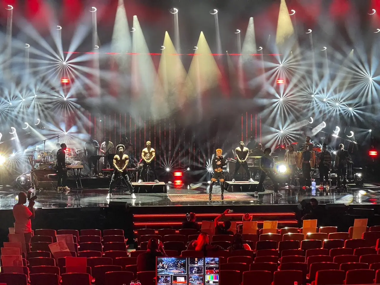 A beautiful sunset with vibrant orange and pink hues over a calm sea.