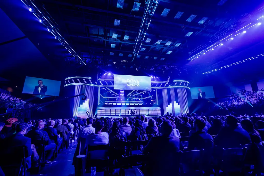 A beautiful sunset with vibrant orange and pink hues over a calm sea.