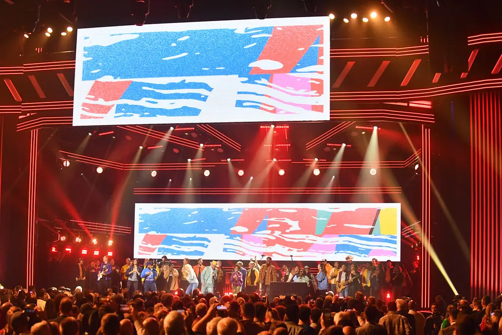 A beautiful sunset with vibrant orange and pink hues over a calm sea.