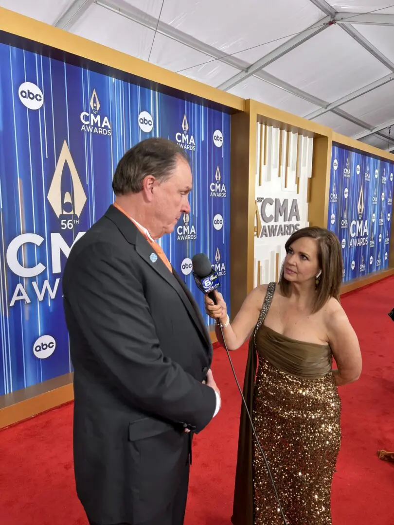 A beautiful sunset with vibrant orange and pink hues over a calm sea.