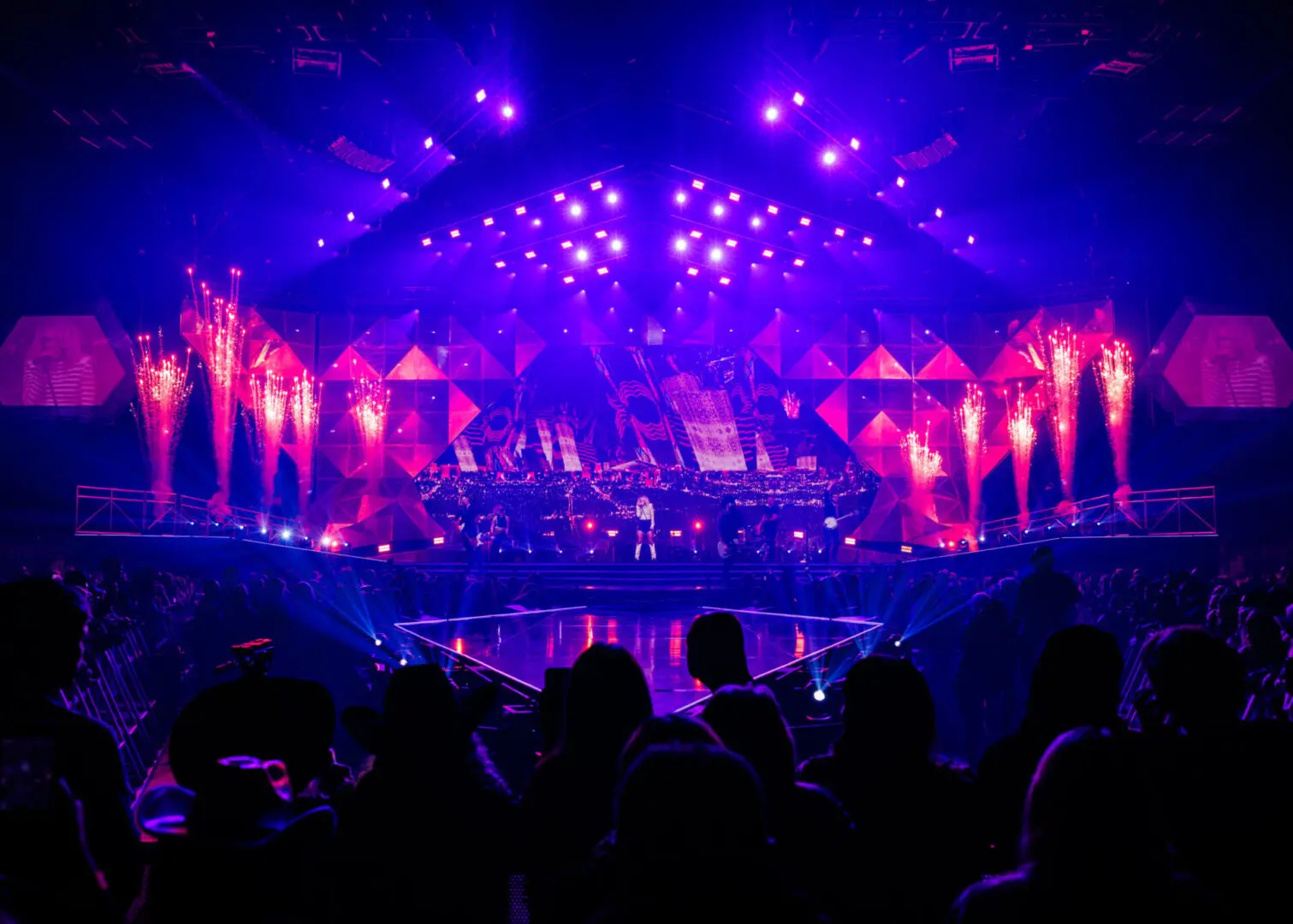 A beautiful sunset with vibrant orange and pink hues over a calm sea.