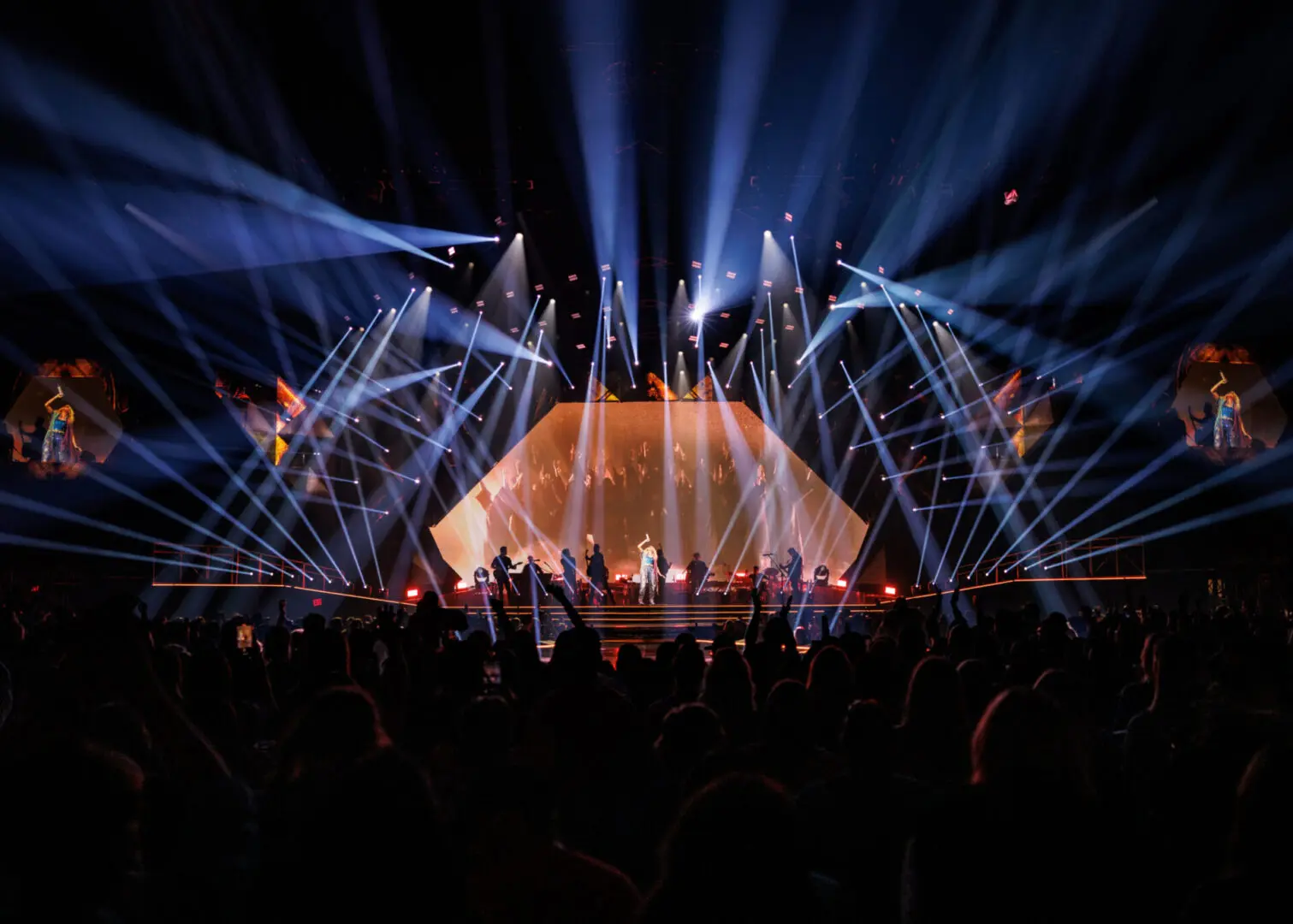 A beautiful sunset with vibrant orange and pink hues over a calm sea.