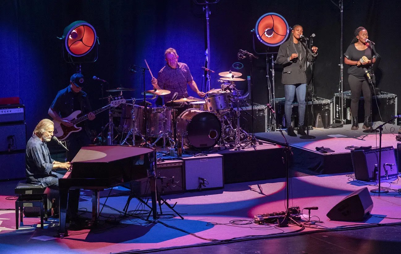 A beautiful sunset with vibrant orange and pink hues over a calm sea.