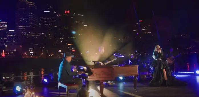 A beautiful sunset with vibrant orange and pink hues over a calm sea.