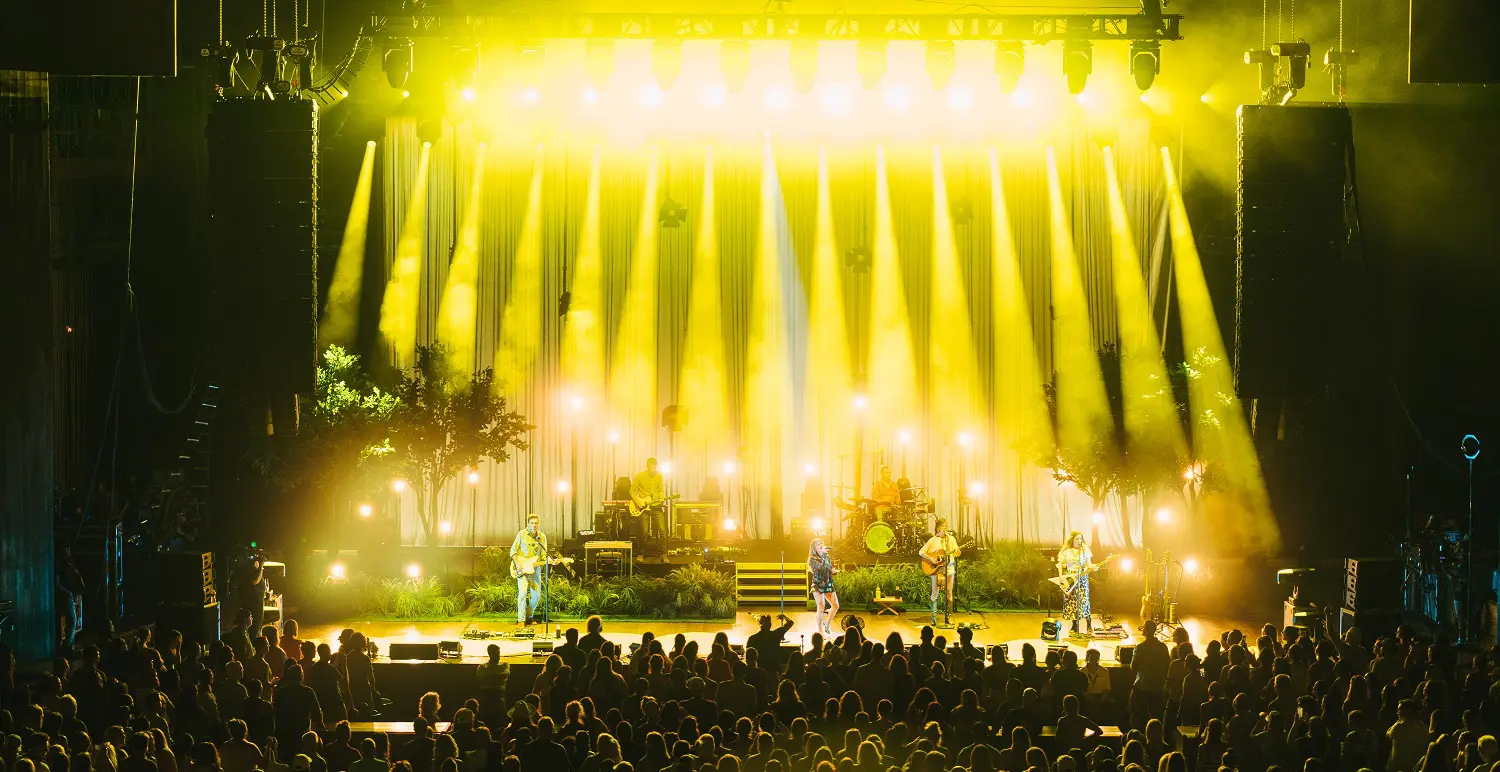 A beautiful sunset with vibrant orange and pink hues over a calm sea.