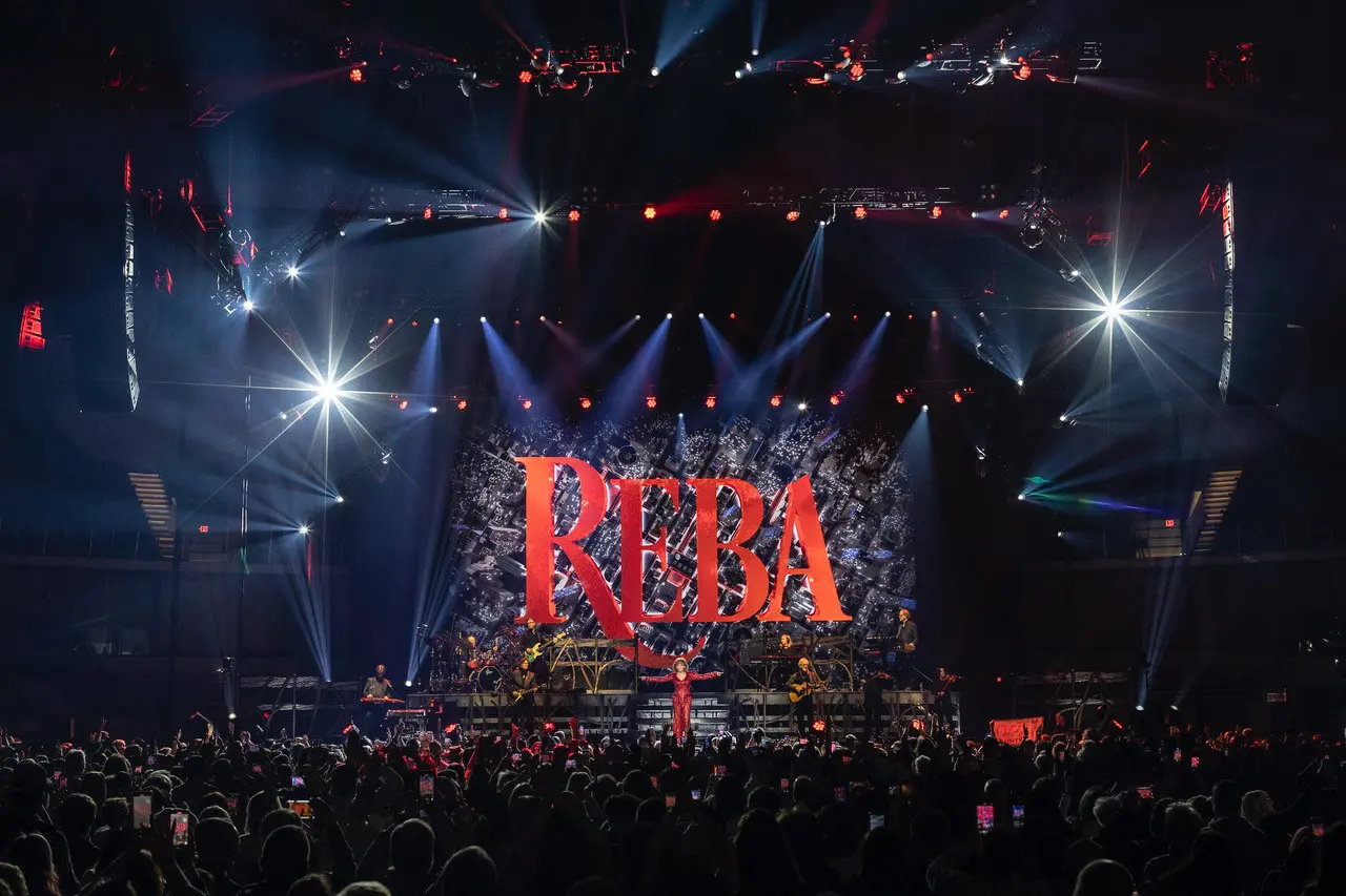 A beautiful sunset with vibrant orange and pink hues over a calm sea.