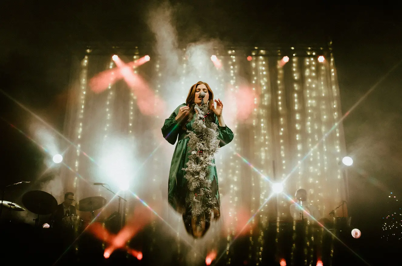 A beautiful sunset with vibrant orange and pink hues over a calm sea.