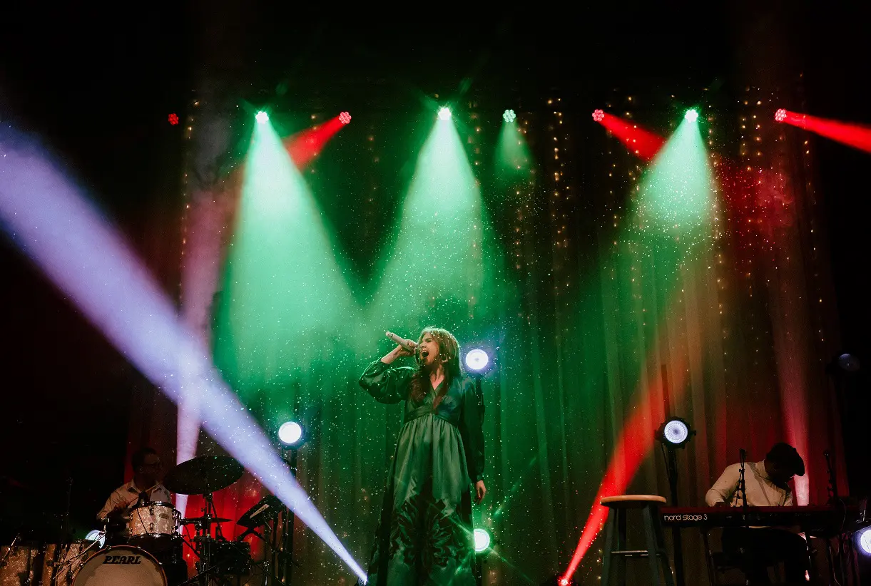 A beautiful sunset with vibrant orange and pink hues over a calm sea.