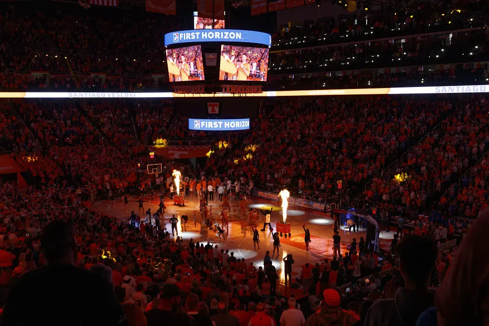 A beautiful sunset with vibrant orange and pink hues over a calm sea.