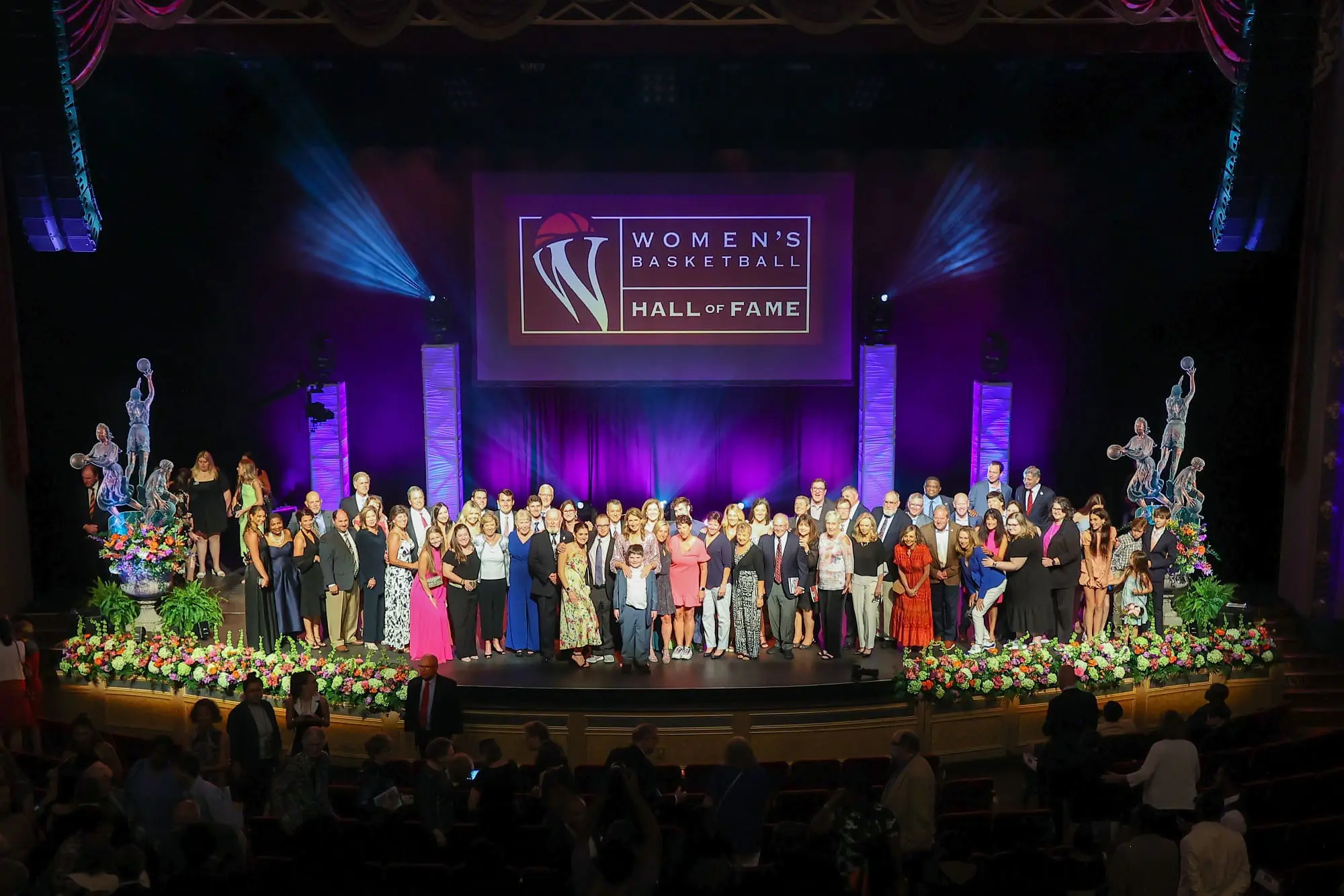 A beautiful sunset with vibrant orange and pink hues over a calm sea.