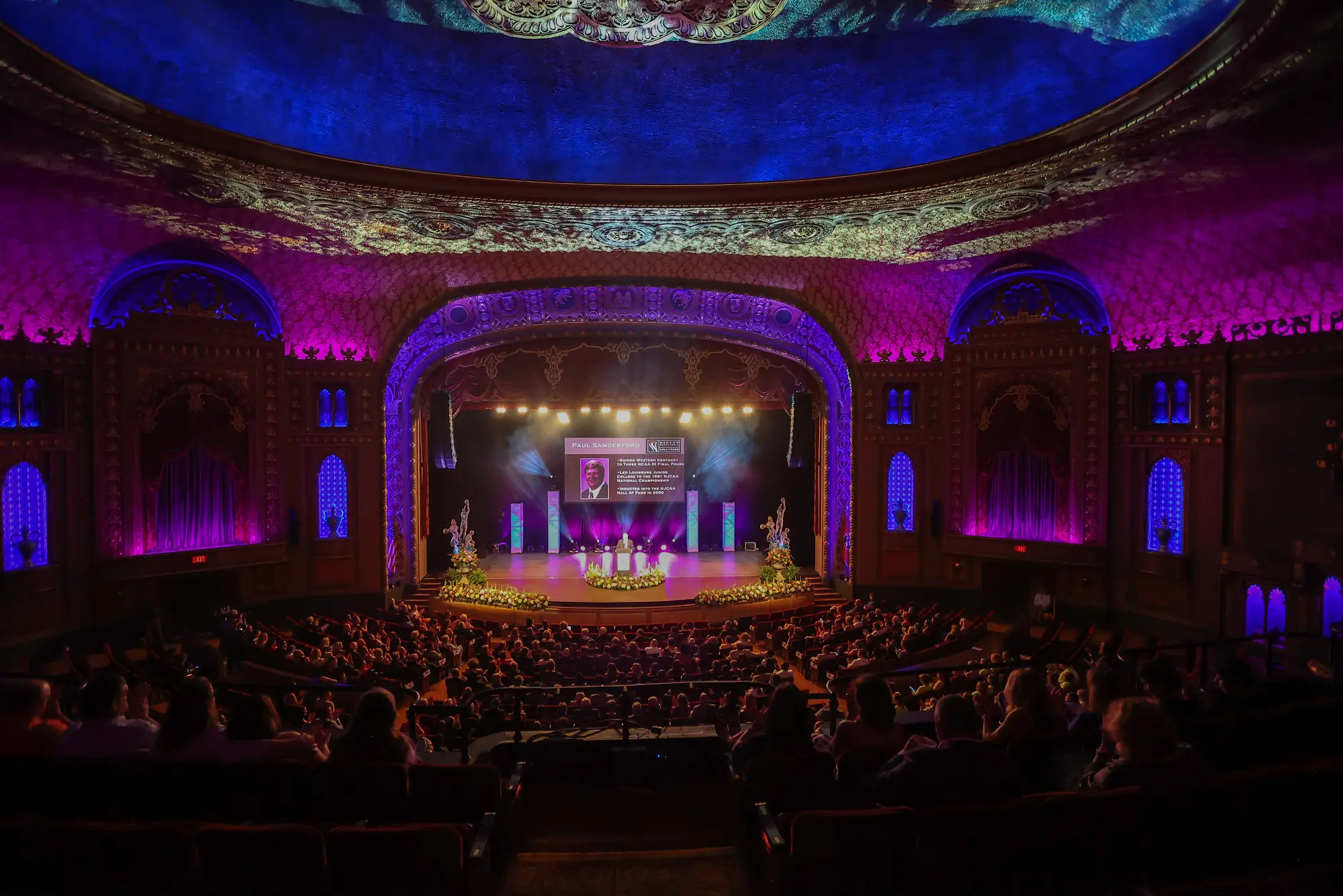 A beautiful sunset with vibrant orange and pink hues over a calm sea.