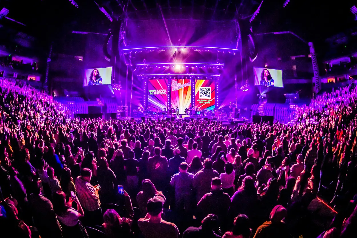 A beautiful sunset with vibrant orange and pink hues over a calm sea.