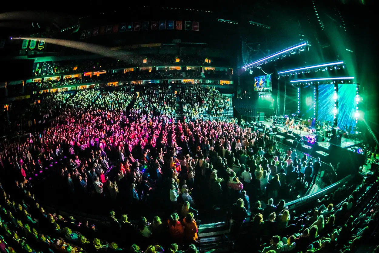 A beautiful sunset with vibrant orange and pink hues over a calm sea.