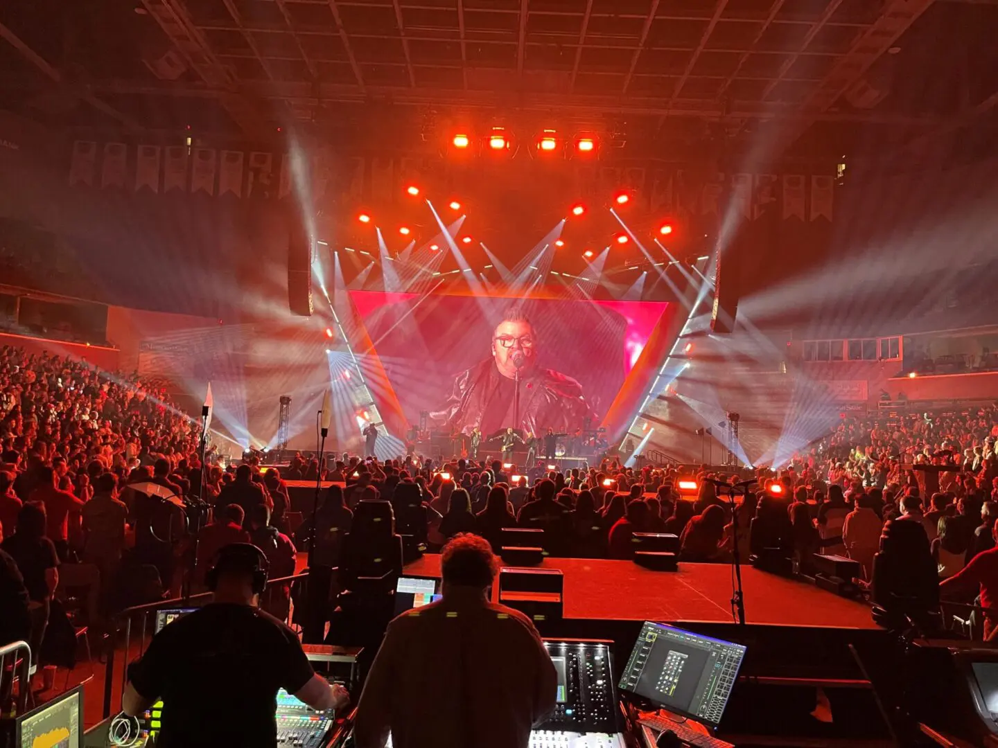 A beautiful sunset with vibrant orange and pink hues over a calm sea.