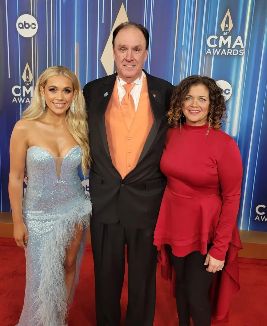 A beautiful sunset with vibrant orange and pink hues over a calm sea.