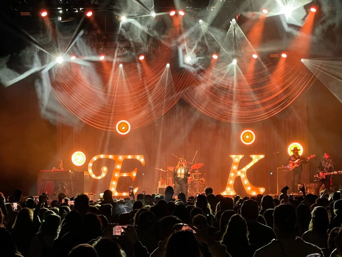 A beautiful sunset with vibrant orange and pink hues over a calm sea.