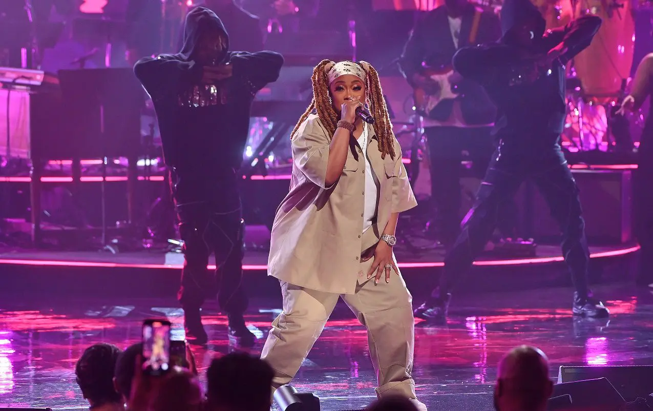 A beautiful sunset with vibrant orange and pink hues over a calm sea.