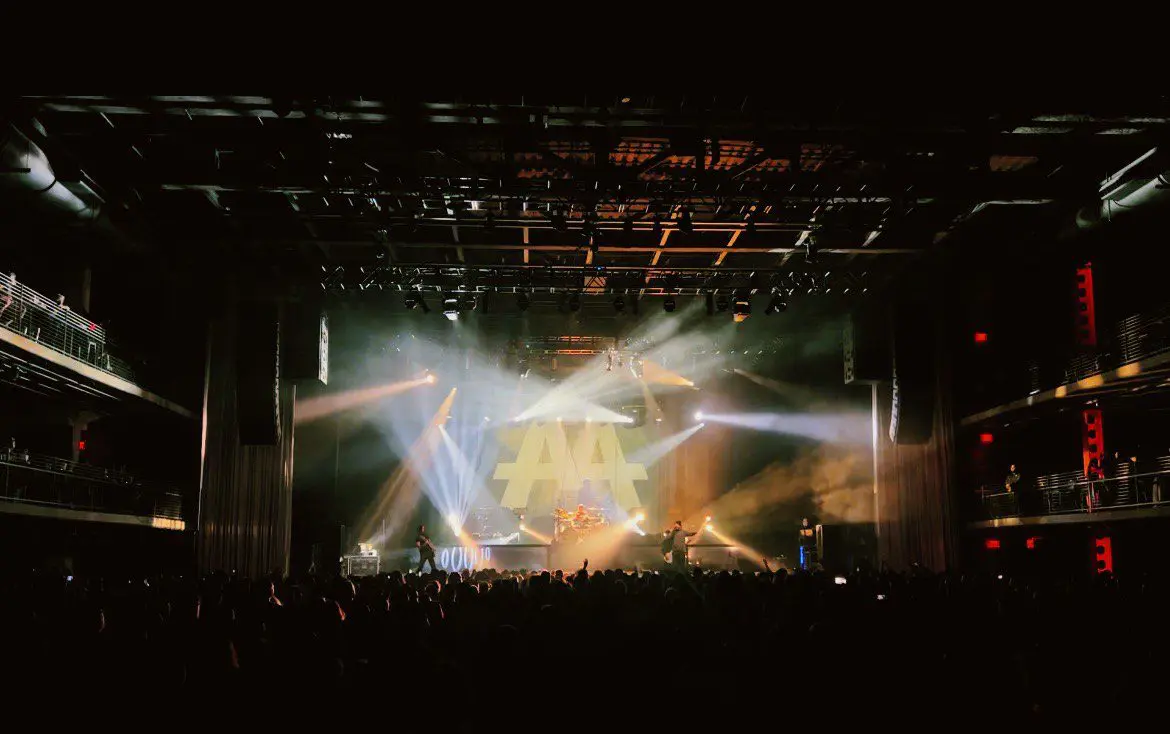 A beautiful sunset with vibrant orange and pink hues over a calm sea.