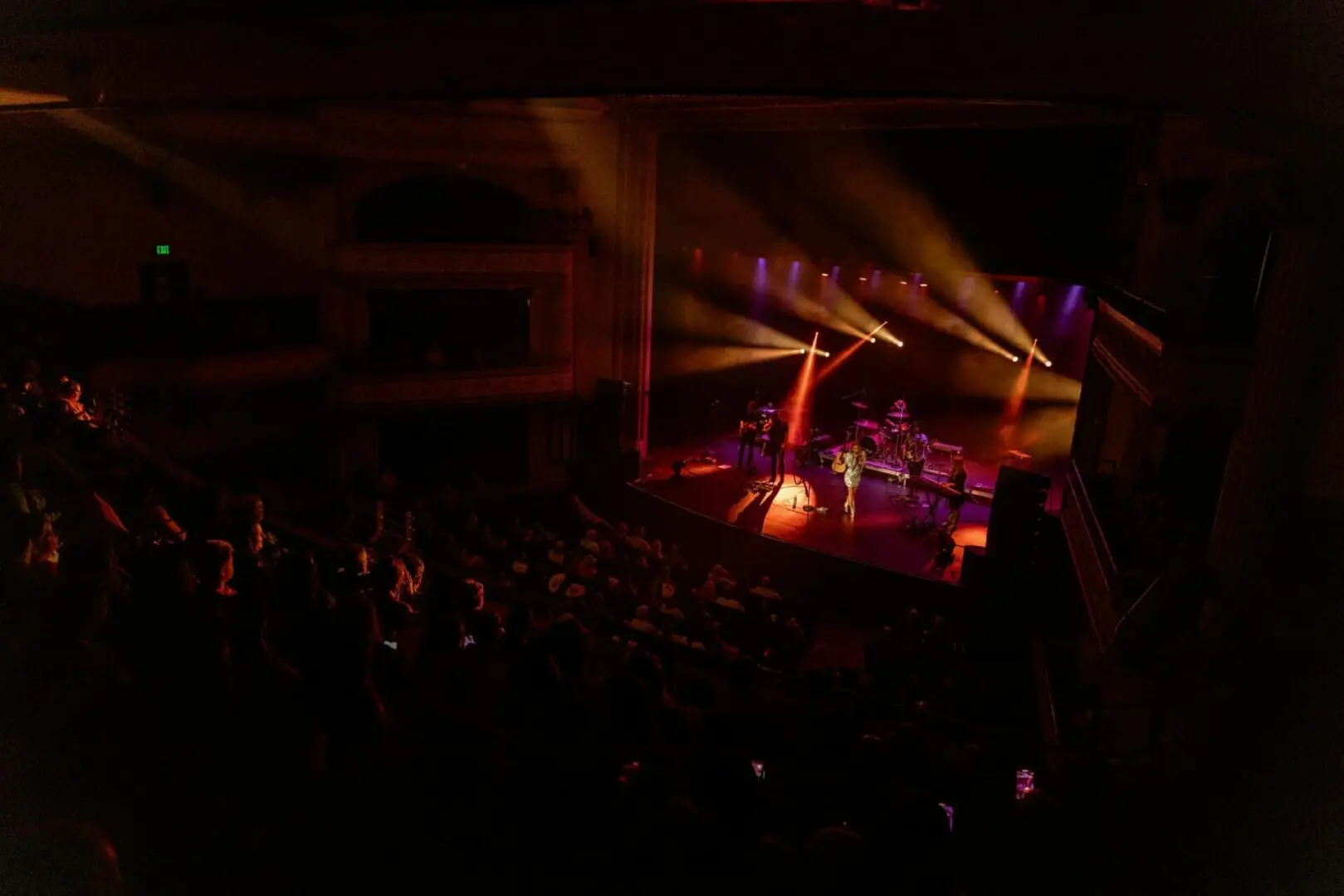 A beautiful sunset with vibrant orange and pink hues over a calm sea.