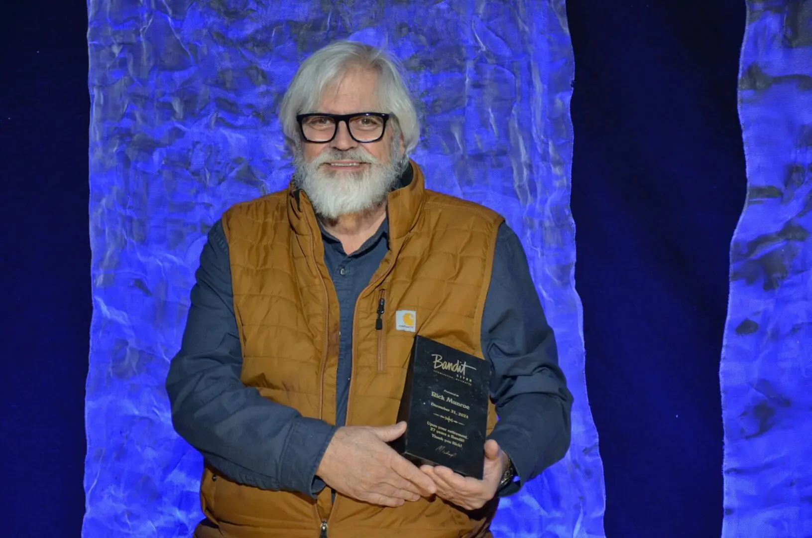 A beautiful sunset with vibrant orange and pink hues over a calm sea.