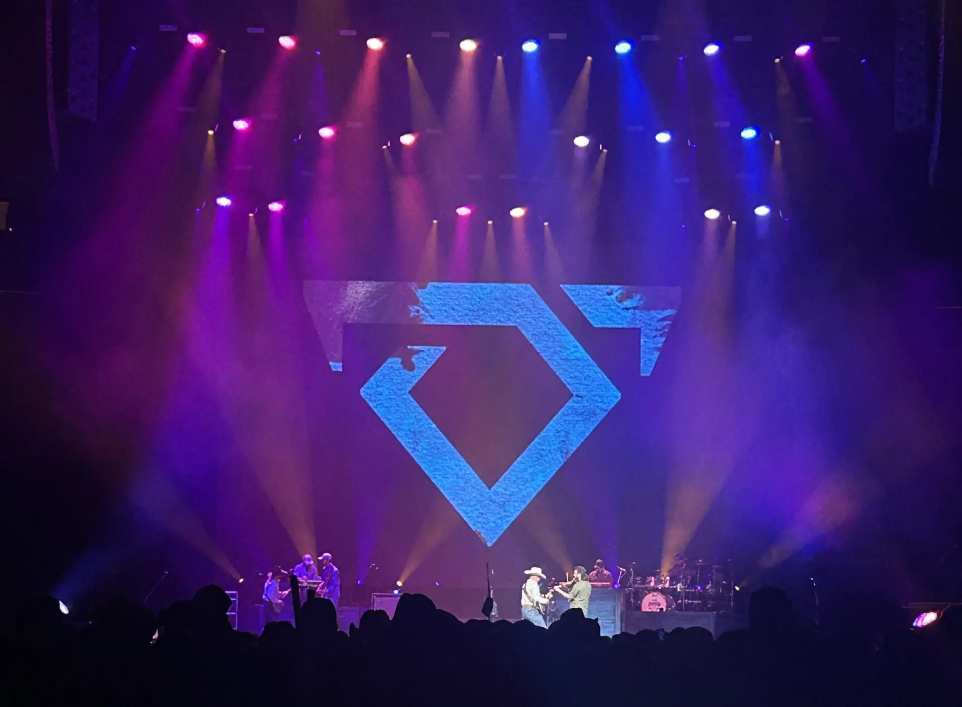 A beautiful sunset with vibrant orange and pink hues over a calm sea.