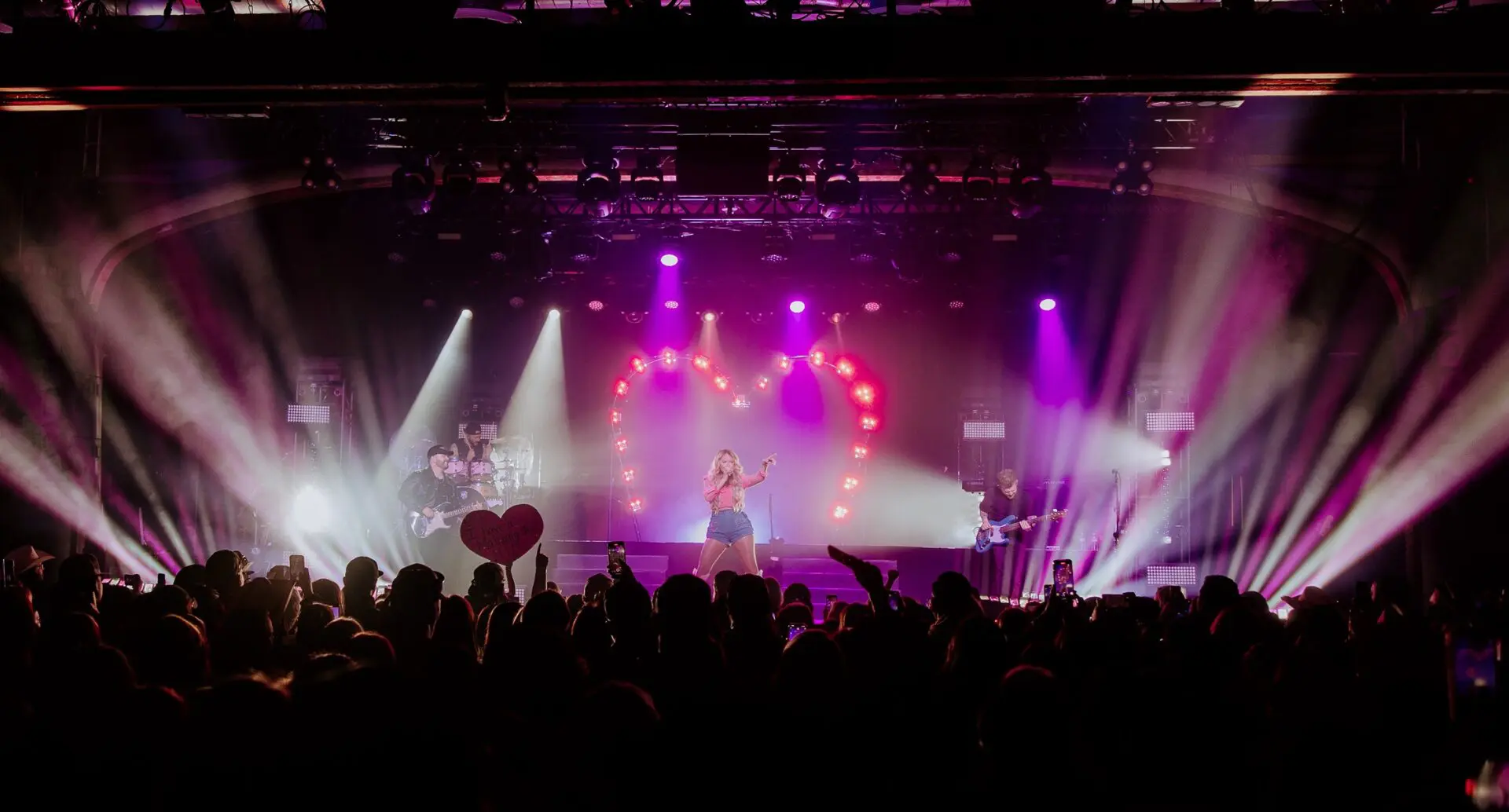A beautiful sunset with vibrant orange and pink hues over a calm sea.