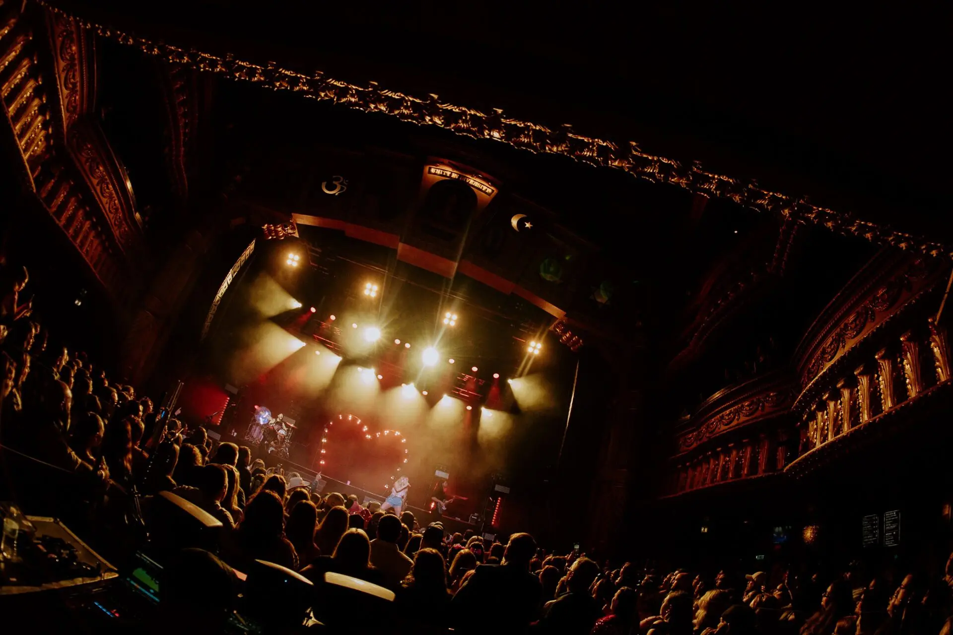 A beautiful sunset with vibrant orange and pink hues over a calm sea.