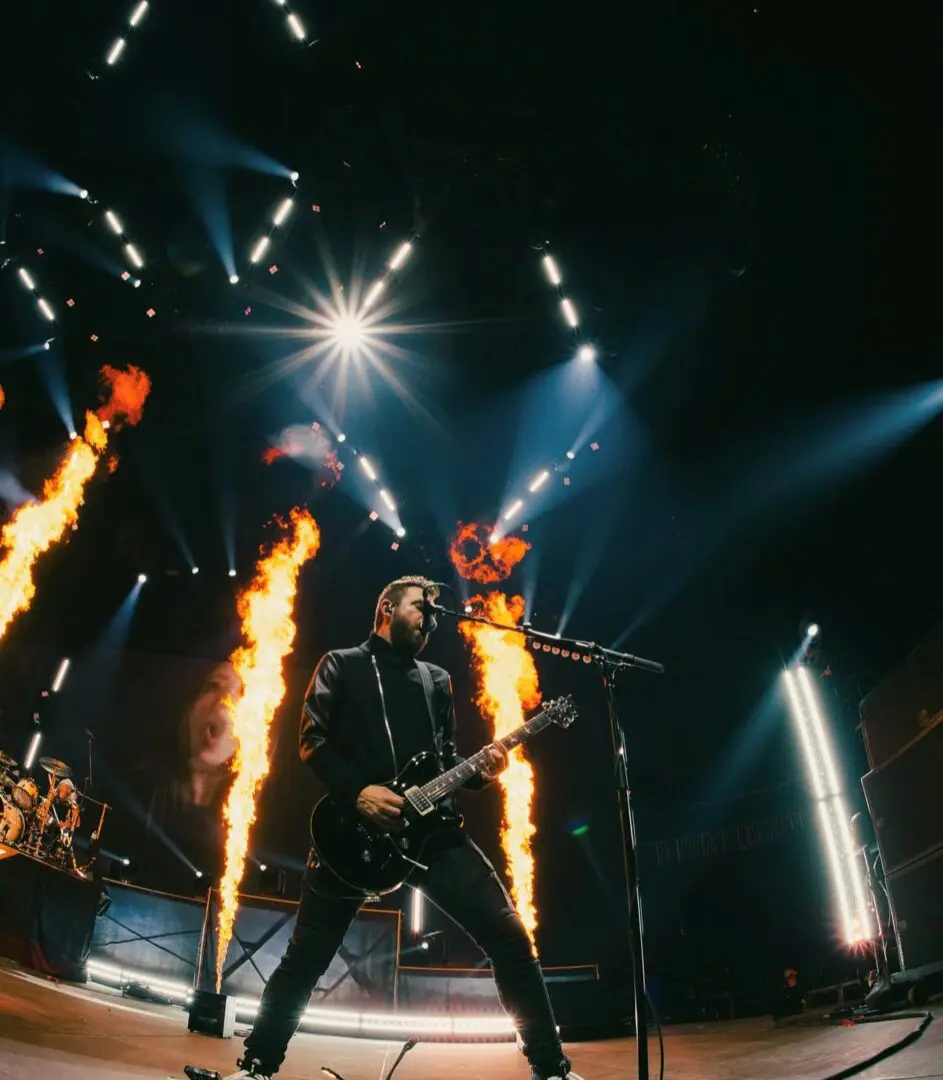 A beautiful sunset with vibrant orange and pink hues over a calm sea.