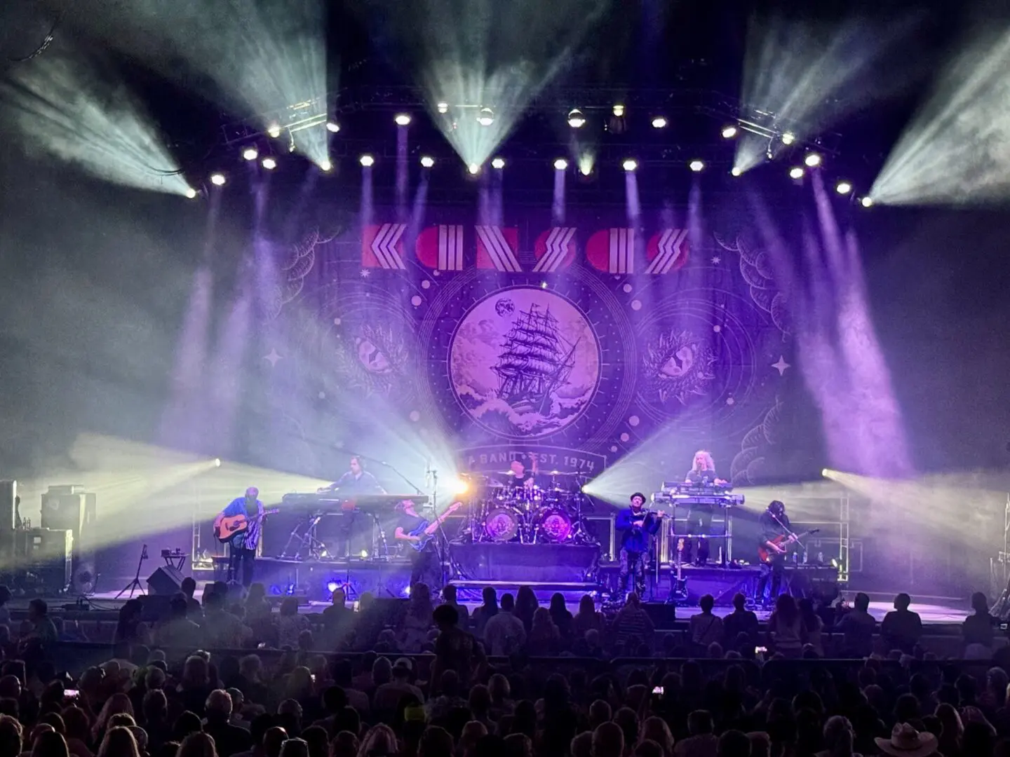 A beautiful sunset with vibrant orange and pink hues over a calm sea.