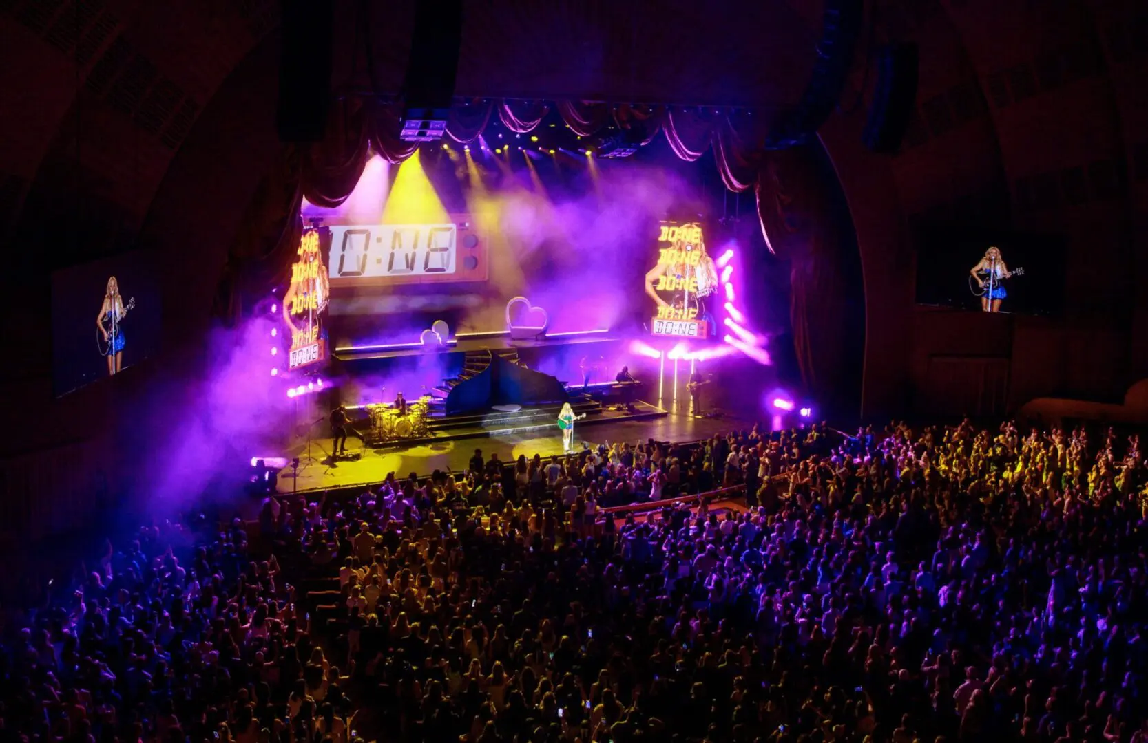 A beautiful sunset with vibrant orange and pink hues over a calm sea.