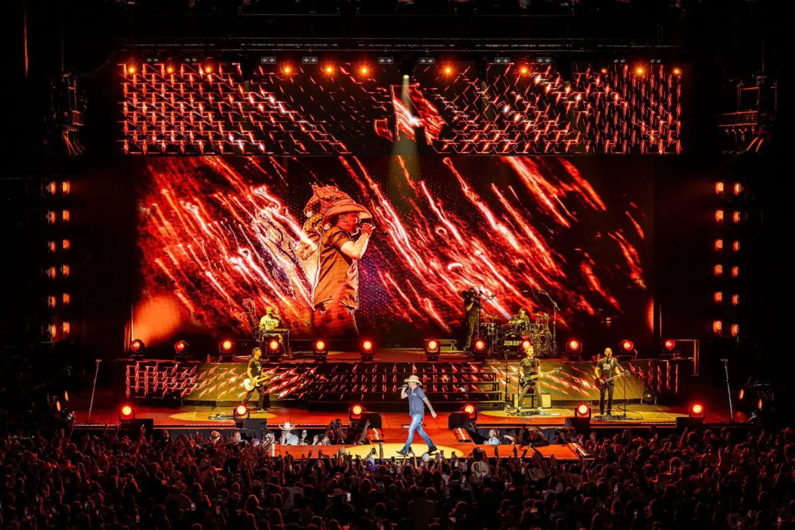 A beautiful sunset with vibrant orange and pink hues over a calm sea.