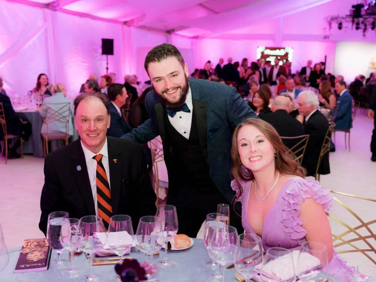 A beautiful sunset with vibrant orange and pink hues over a calm sea.