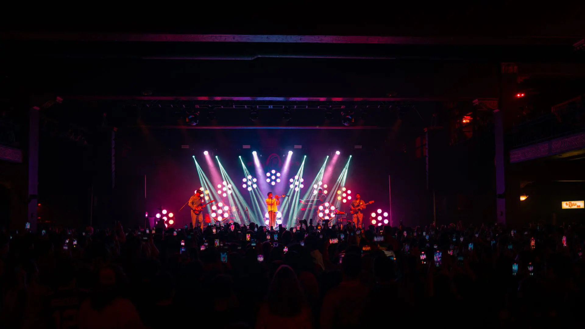 A beautiful sunset with vibrant orange and pink hues over a calm sea.