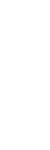 A tall, white candle glowing softly in the dark.