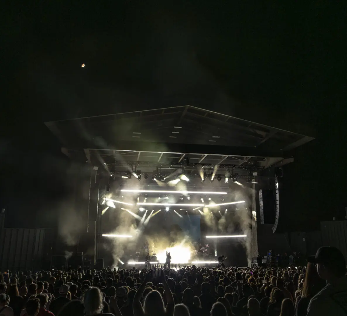 A beautiful sunset with vibrant orange and pink hues over a calm sea.