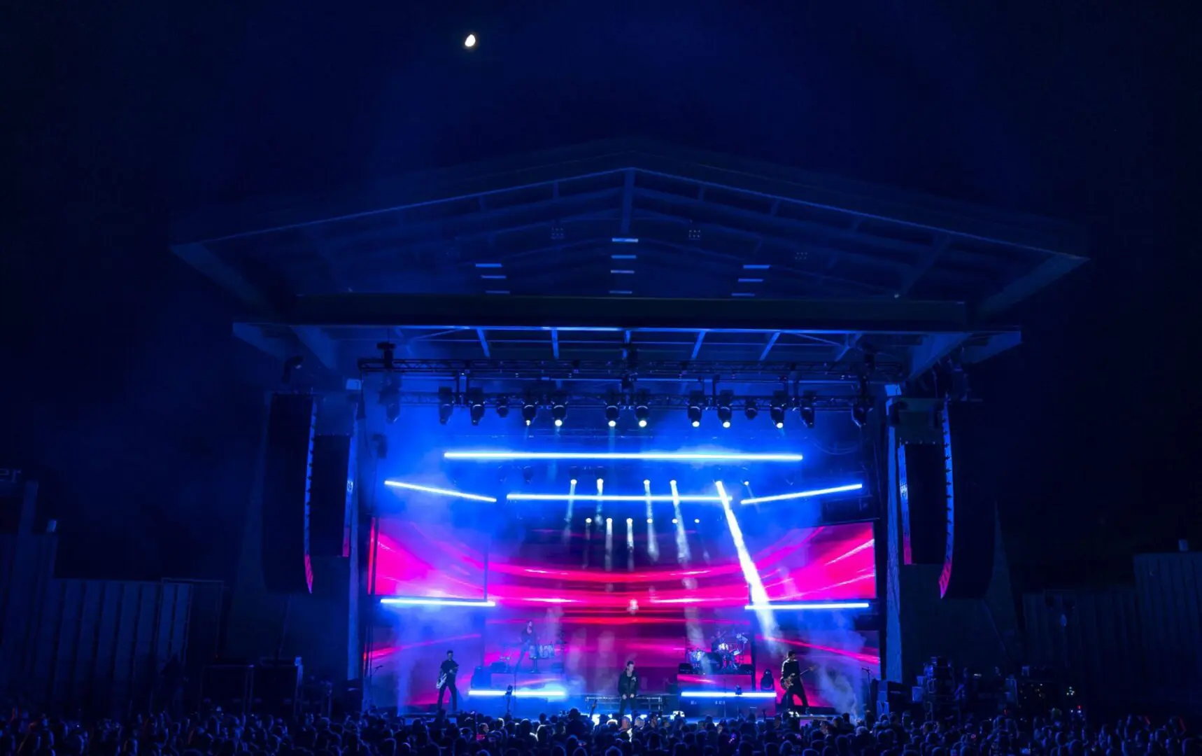 A beautiful sunset with vibrant orange and pink hues over a calm sea.