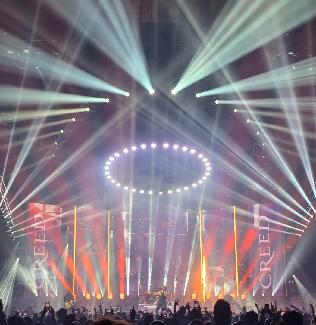 A beautiful sunset with vibrant orange and pink hues over a calm sea.