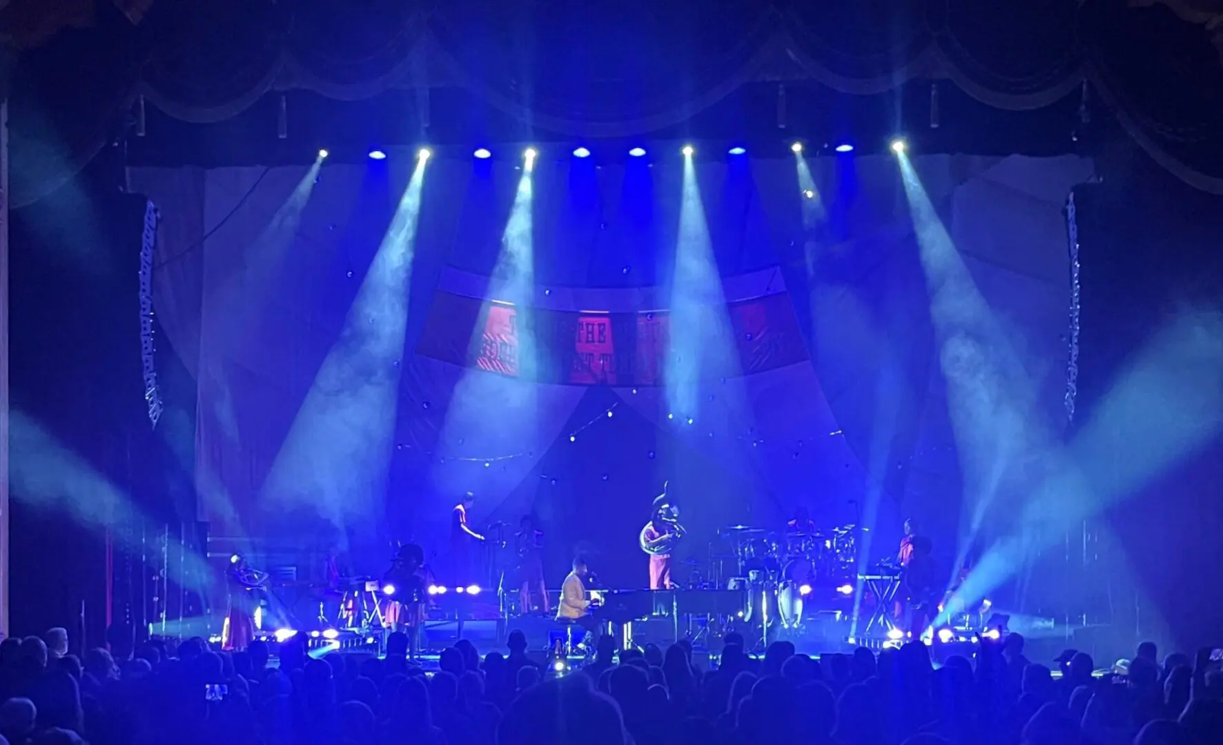 A beautiful sunset with vibrant orange and pink hues over a calm sea.