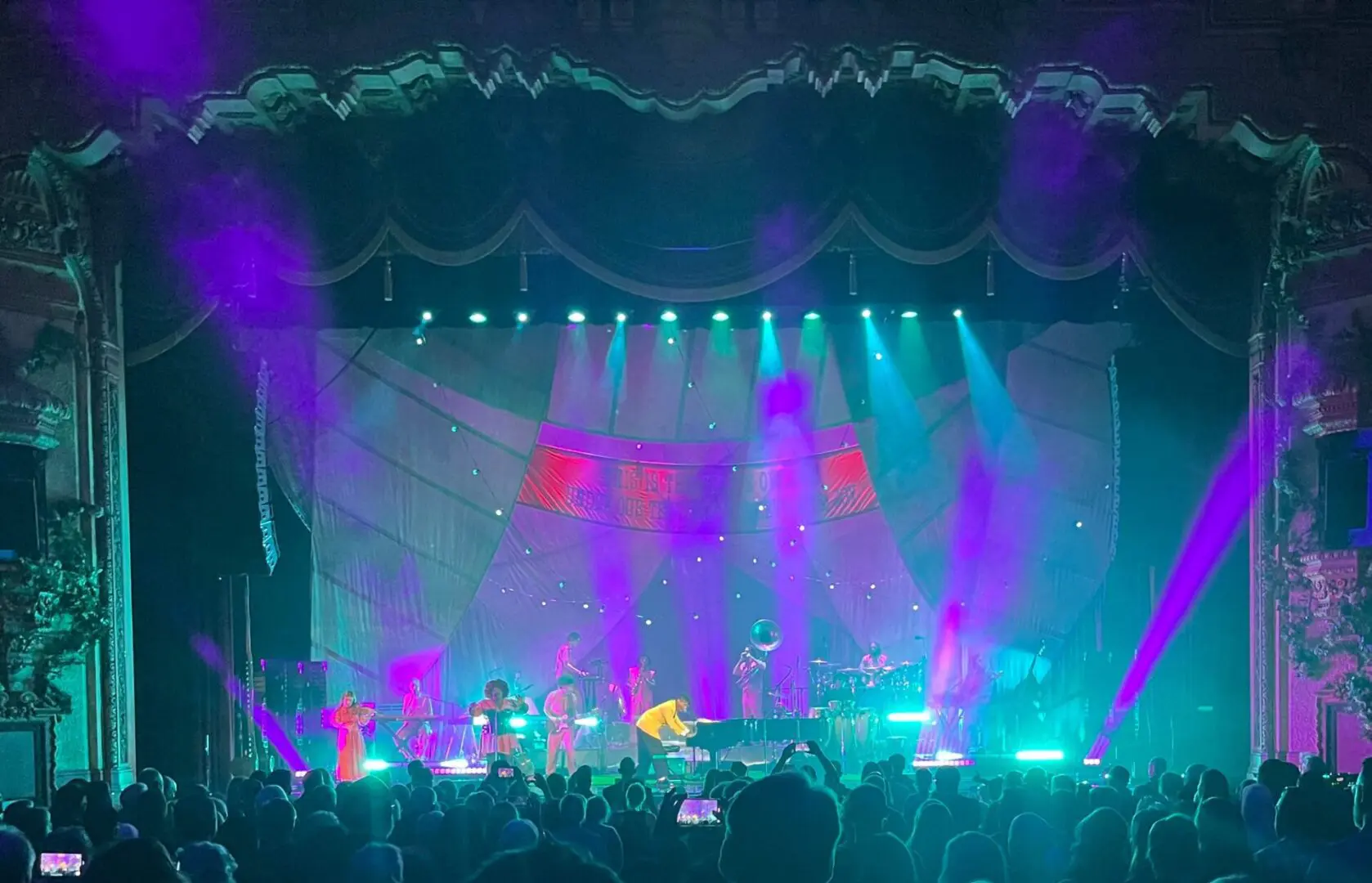 A beautiful sunset with vibrant orange and pink hues over a calm sea.