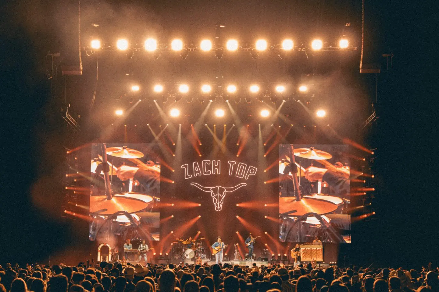 A beautiful sunset with vibrant orange and pink hues over a calm sea.