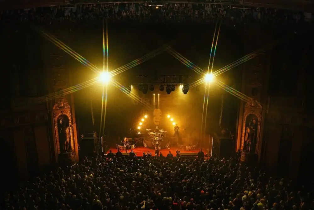 A beautiful sunset with vibrant orange and pink hues over a calm sea.