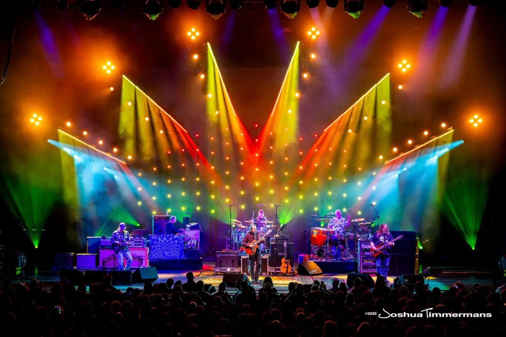 A beautiful sunset with vibrant orange and pink hues over a calm sea.