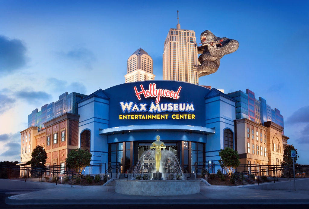 Welcome to the Wax Museum Entertainment Center with statues and a fountain.