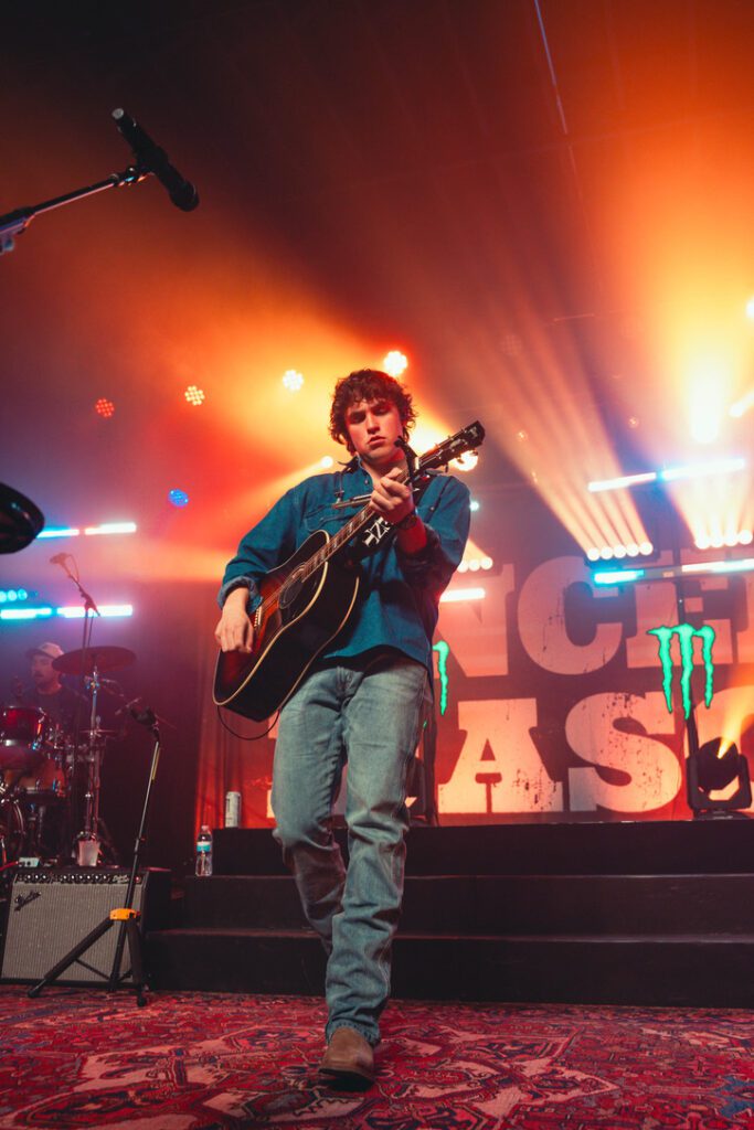 A beautiful sunset with vibrant orange and pink hues over a calm sea.